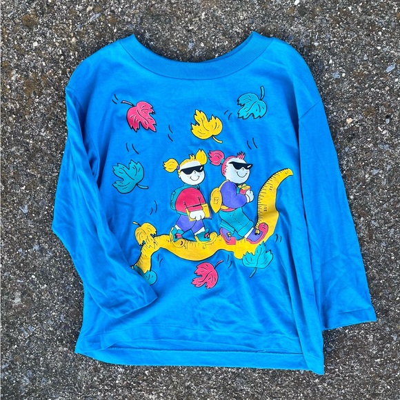 VINTAGE BLUE LONG SLEEVE TSHIRT WITH STUDENTS RIDING A RULER 4-6X - Picture 1 of 5